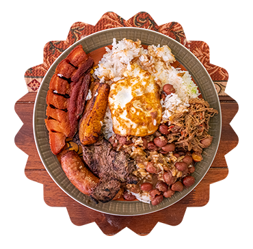 This picture features a delicious plate originated from Colombia. it has multiple things in the plate and each adds its own flavour creating a gastronomical bombshell 